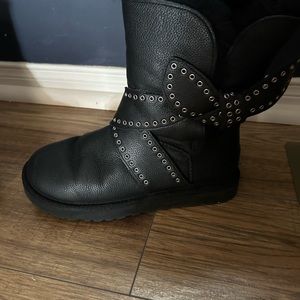 Leather Ugg boot with fur inside. Only wore a few times. The boots are a size 7.